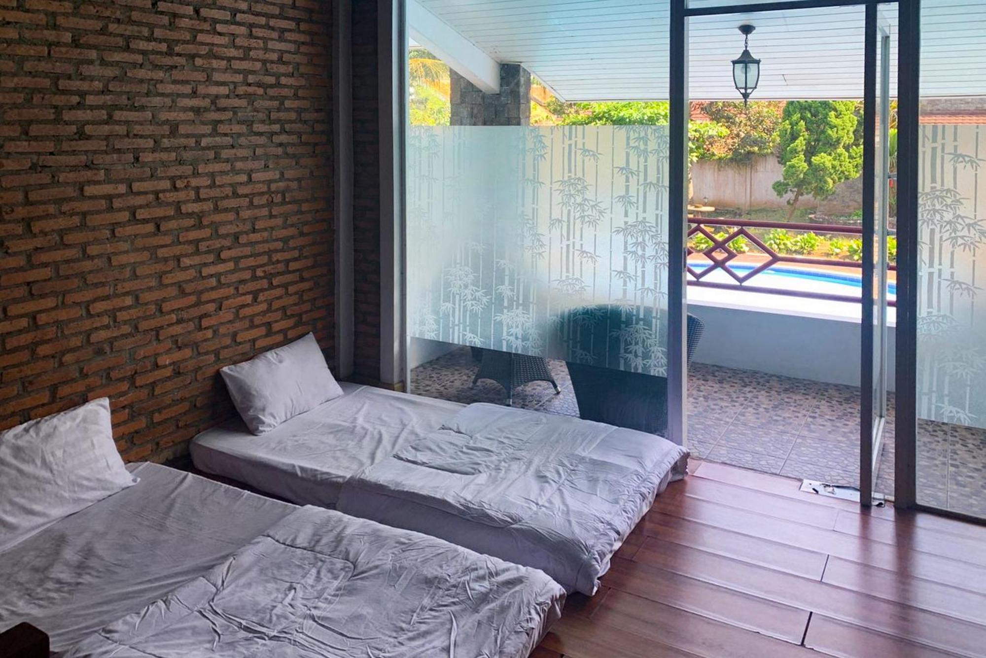 Urbanview Hotel Villa Q Gisting Bandjarnegeri Екстер'єр фото
